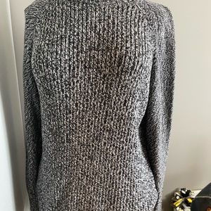 Turtle neck marled black and white sweater.